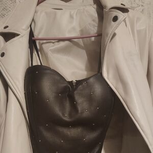 Cream colored Faux leather jacket, black heart shaped faux leather studded top
